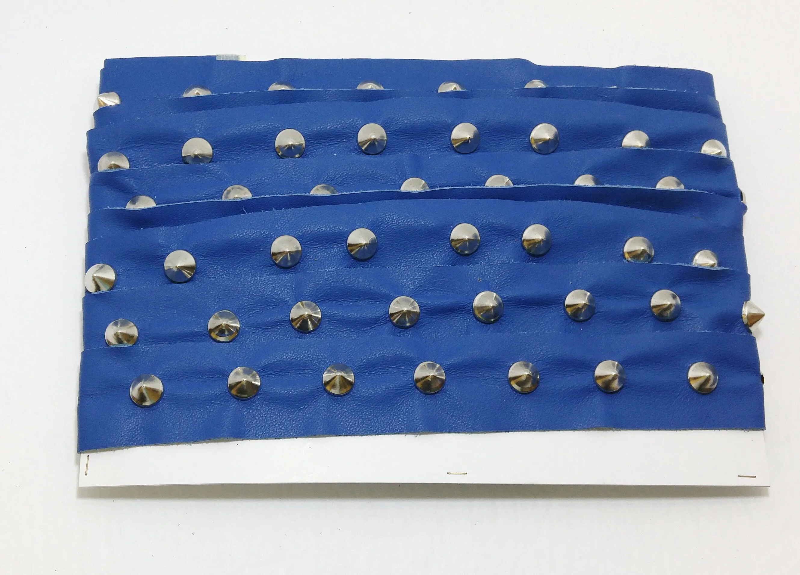 1 YD of 1-1/2" wide Genuine Cowhide Leather Trim Tape with Silver Cone-shaped Nailheads edge binding; top stitch; Blue Duquessa 3758XDB